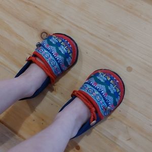 Shoes with cute bells on the outside of each shoe